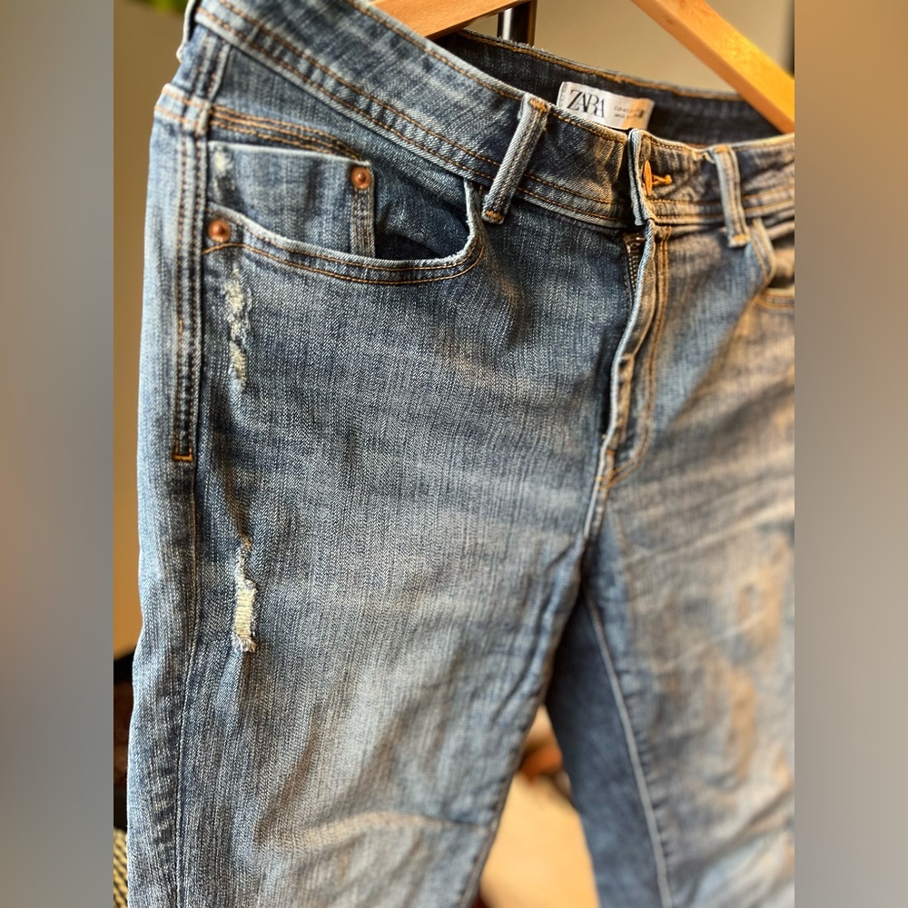 Blue frayed jeans
